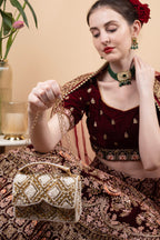 Handcrafted clutch bag with pearl and sequin geometric design structured silhouette short handle and detachable chain for wedding and festive wear