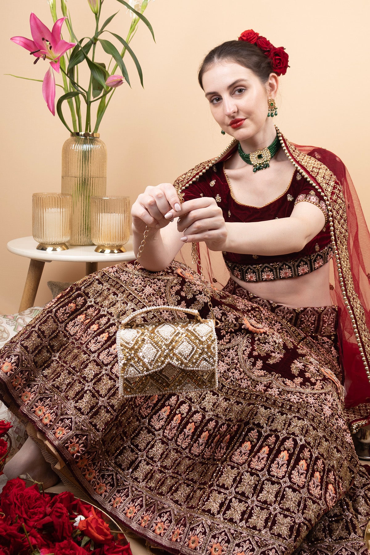 Handcrafted clutch bag with pearl and sequin geometric design structured silhouette short handle and detachable chain for wedding and festive wear
