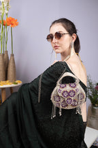 Silver hand-embellished clutch bag with cutdana pearl crystal and sequin work with chain strap for wedding and festive wear