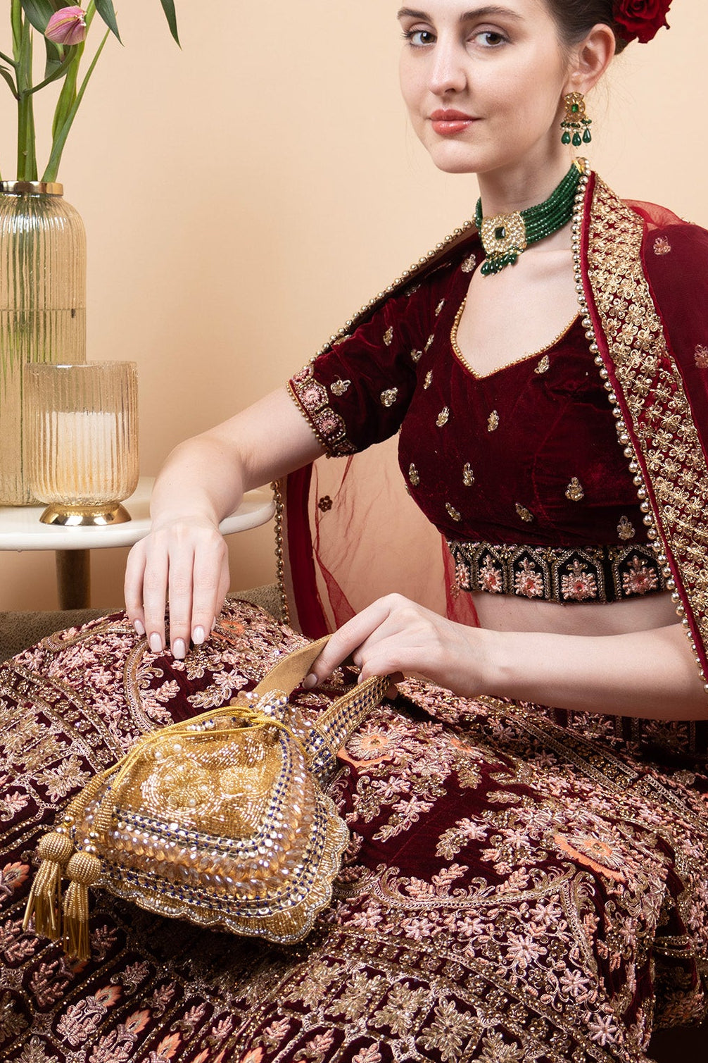 Gold handcrafted potli bag with beadwork and sequin embellishments for wedding and festive wear
