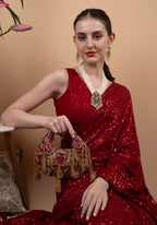 Red beaded floral mirror work clutch bag with handcrafted detailing and suede inner lining for wedding and festive wear