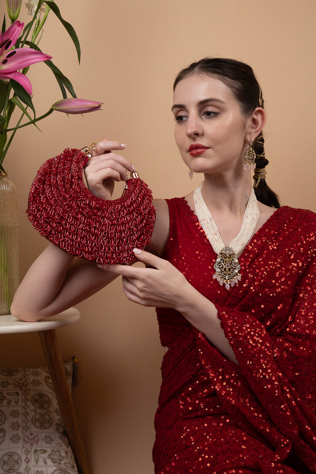 Red cut dana embellished clutch bag with handcrafted detailing for wedding, bridal and festive party wear Hover Image