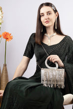 Silver sequin fringe clutch bag with ring handle detachable chain inner pocket and polyester lining for party and festive wear