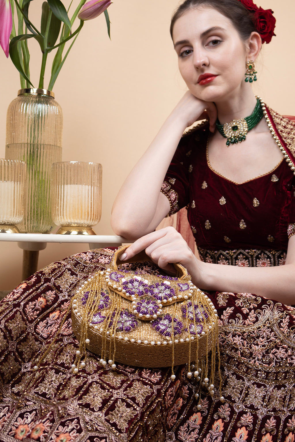 Gold hand-embellished clutch bag with cutdana pearl crystal and sequin work with chain strap for wedding and festive wear