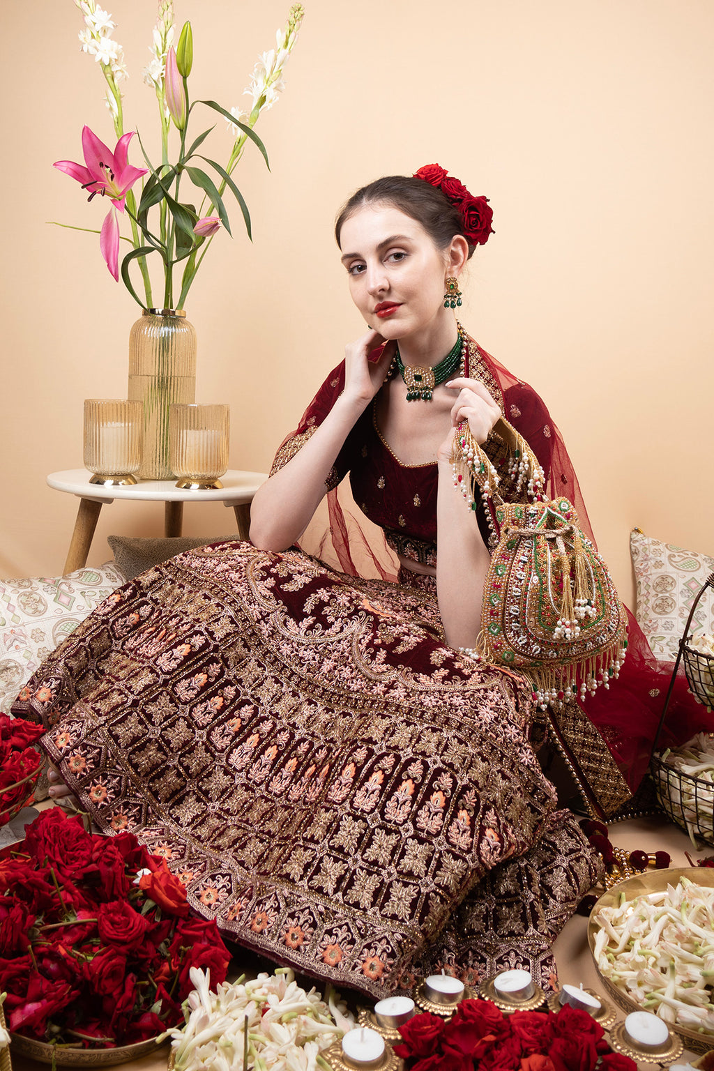 Gold green handcrafted potli bag with beads, stone and pearl work for wedding and festive wear