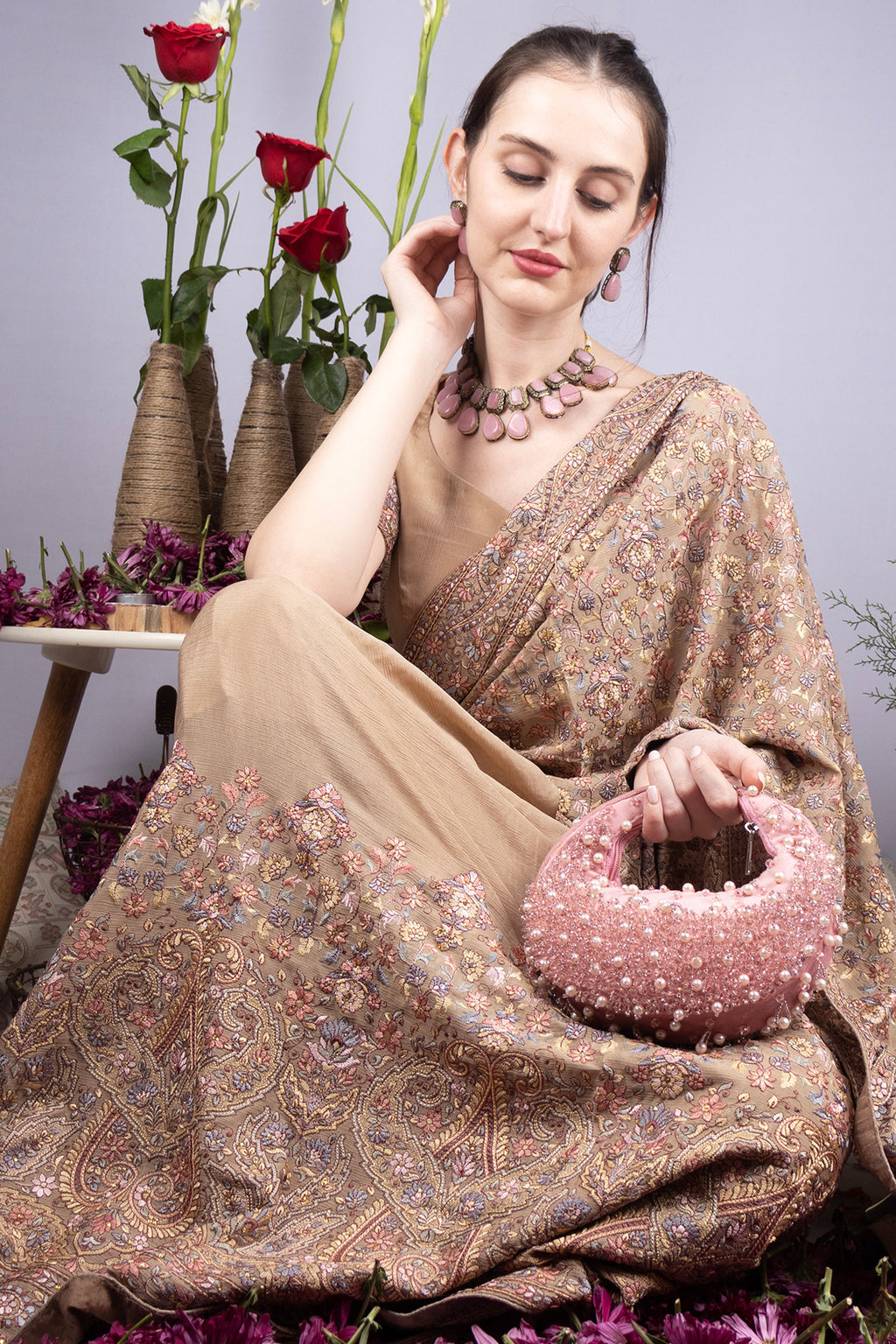 Blush pink pearl and bead embellished ethnic handle bag with suede lining for wedding and festive wear