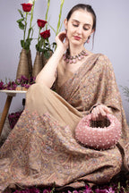 Blush pink pearl and bead embellished ethnic handle bag with suede lining for wedding and festive wear