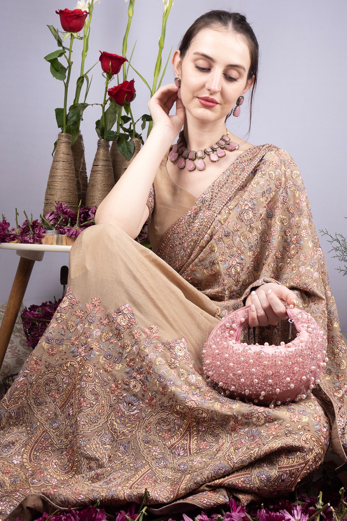 Blush pink pearl and bead embellished ethnic handle bag with suede lining for wedding and festive wear