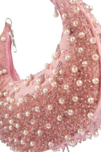 Blush pink pearl and bead embellished ethnic handle bag with suede lining for wedding and festive wear