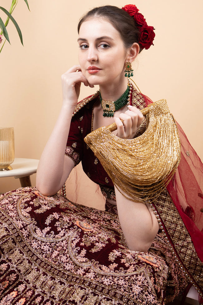 Gold cut dana embellished clutch on sequenced fabric with chain strap for wedding and party wear Hover Image