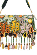Handcrafted beaded clutch with mirror embellishments and sequin work on suede fabric for festive wear