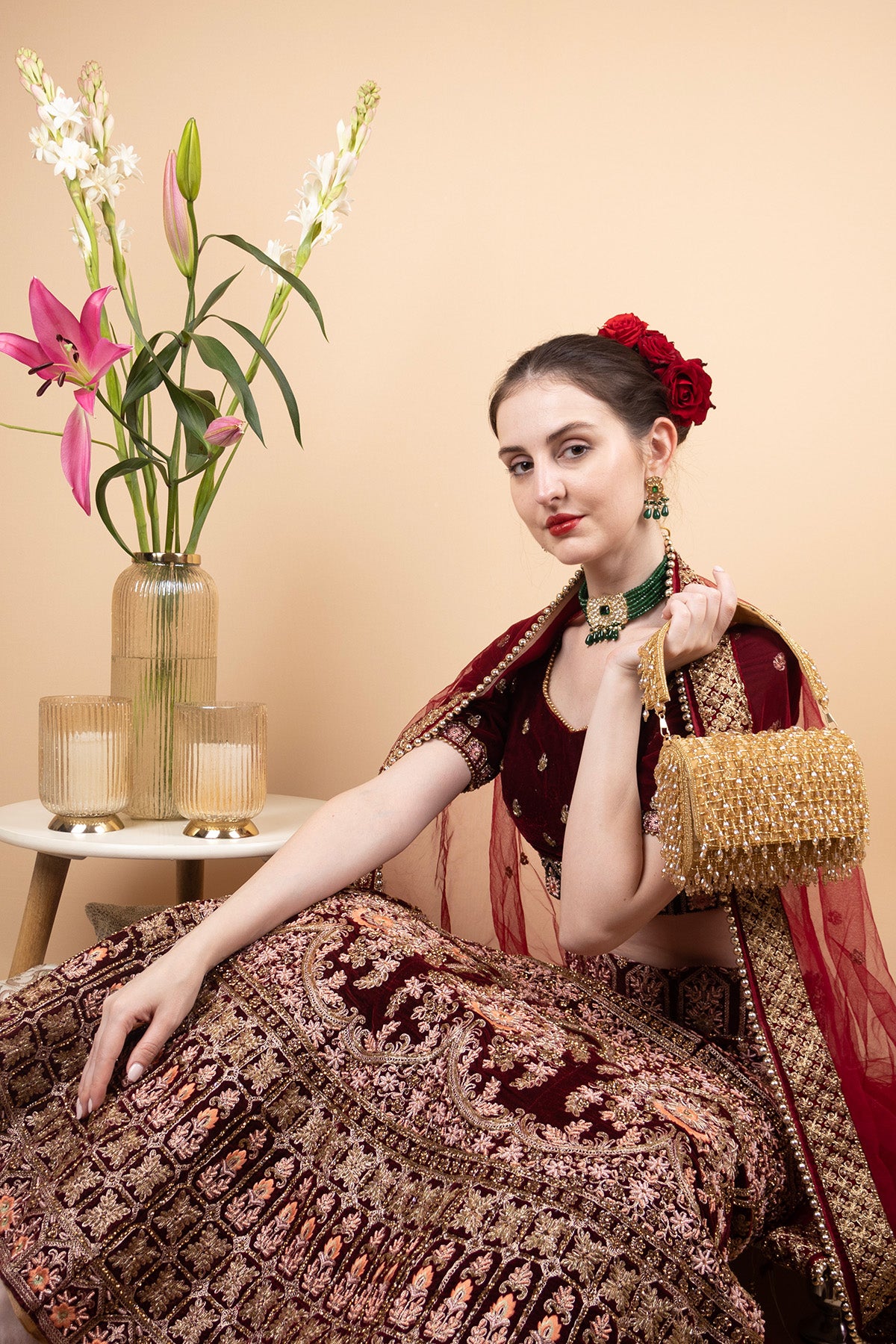 Gold handcrafted clutch with cutdana and crystal embellishments, velvet lining and handle for wedding and party wear