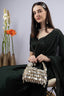 Emerald green handcrafted statement bag with mirror cutdana and sequin embellishments for wedding and festive wear