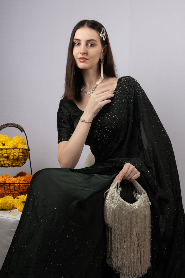 Eeth Handcrafted silver Cut Dana Long Tassel Clutch Bag Main Image
